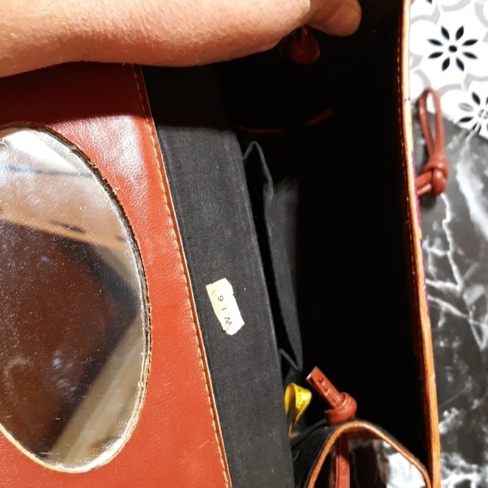 Genuine leather hand tooled in India